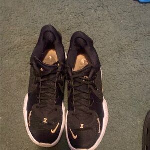 Black and Gold Athletic basketball shoes PG1
